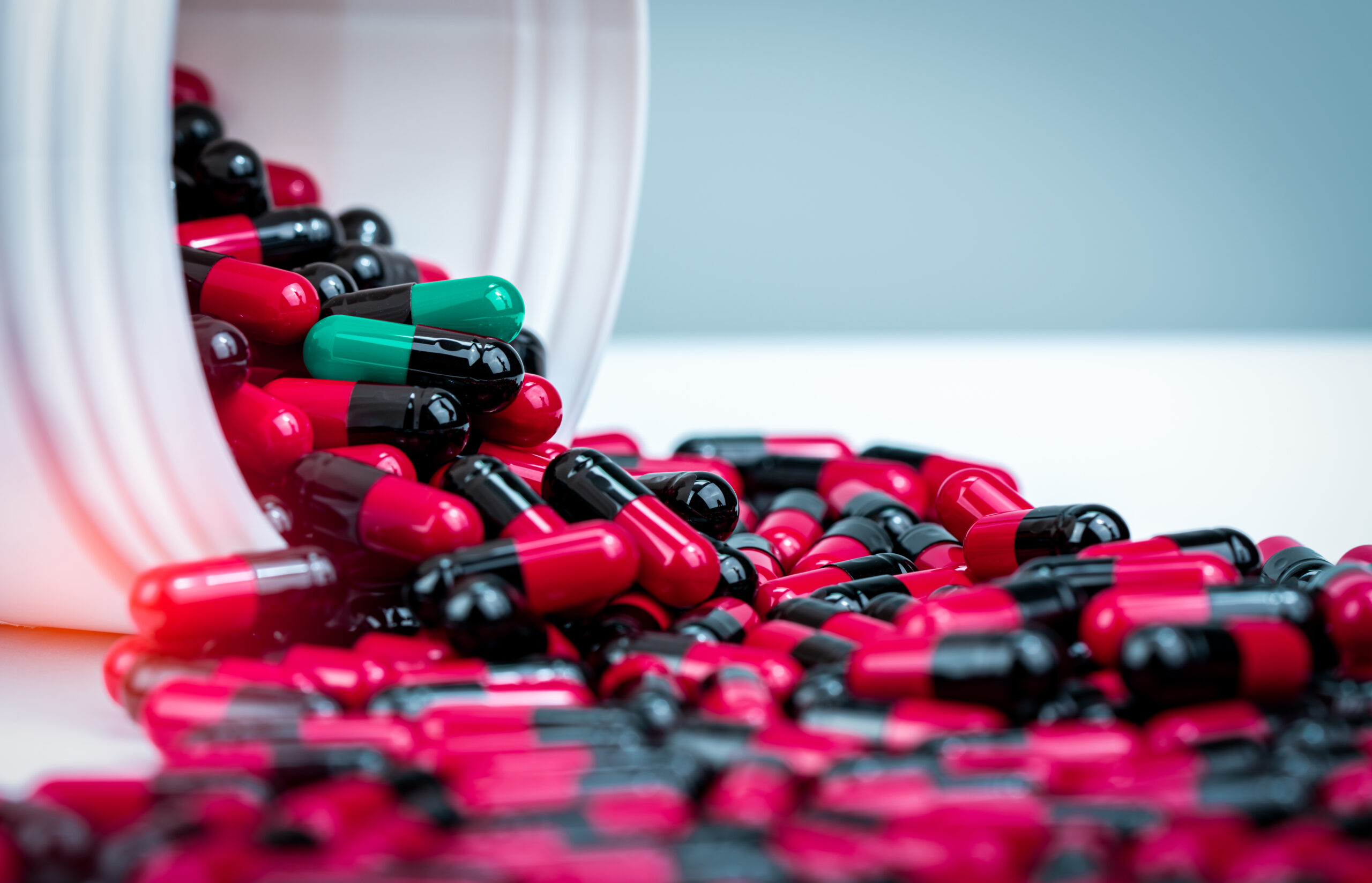 vecteezy capsules pill spilled out from white plastic bottle 7773874 scaled