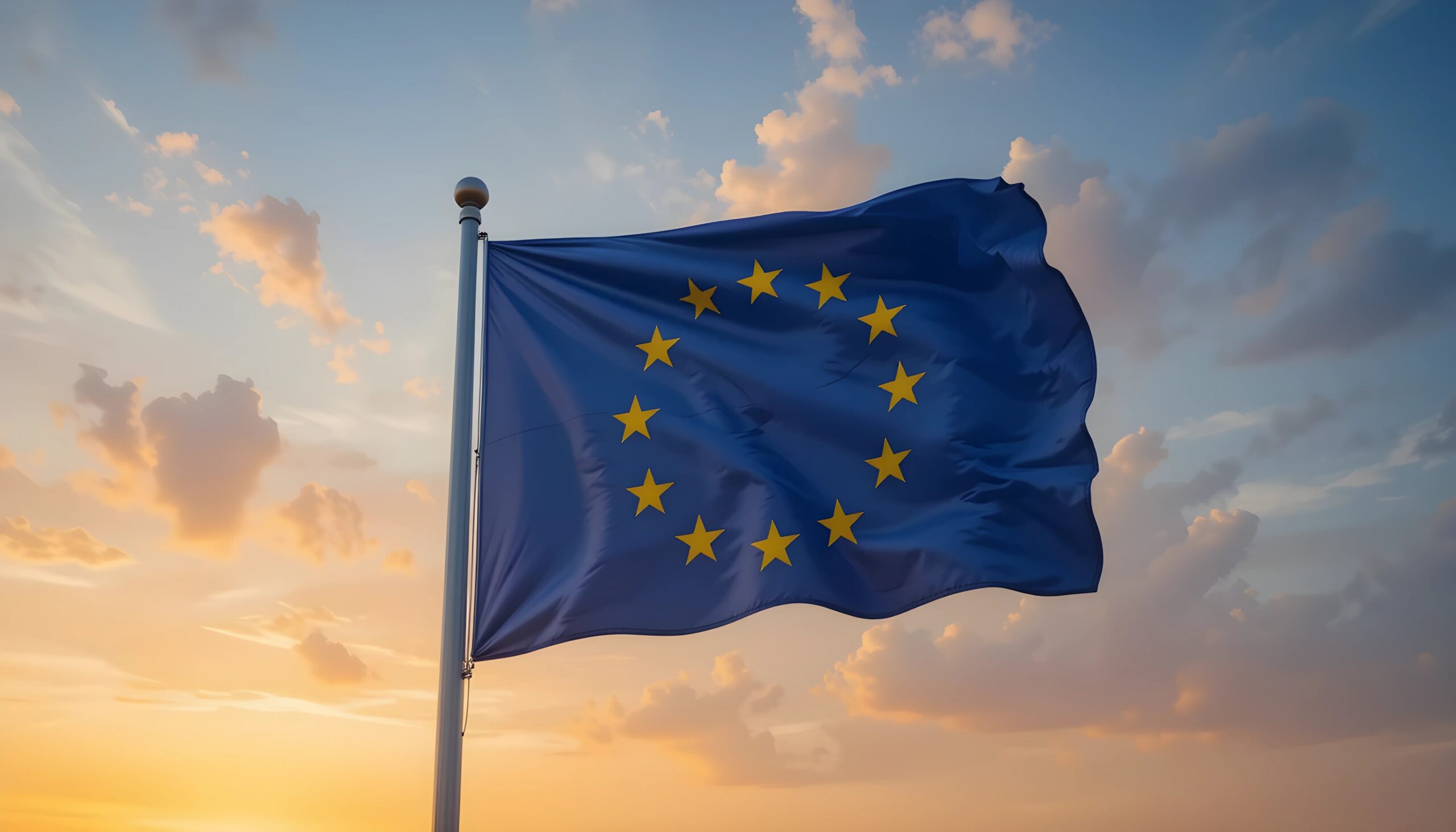 vecteezy european union flag flapping against a sunset sky 58140327 scaled