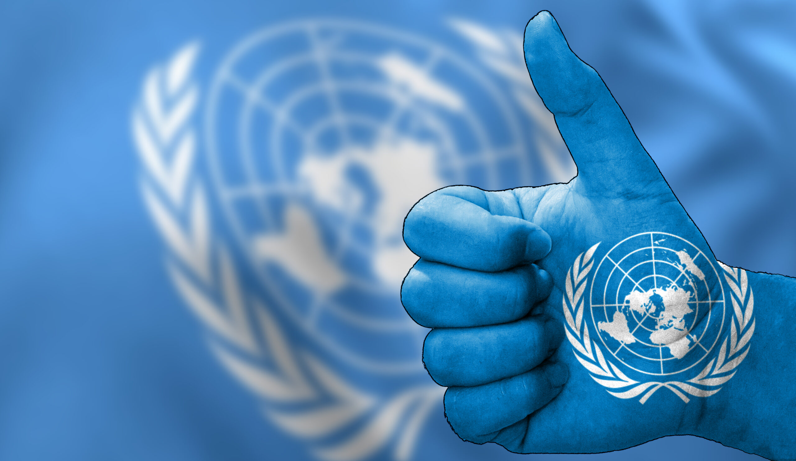 vecteezy thumbs up in approval with the united nations flag painted 53124788 1 scaled