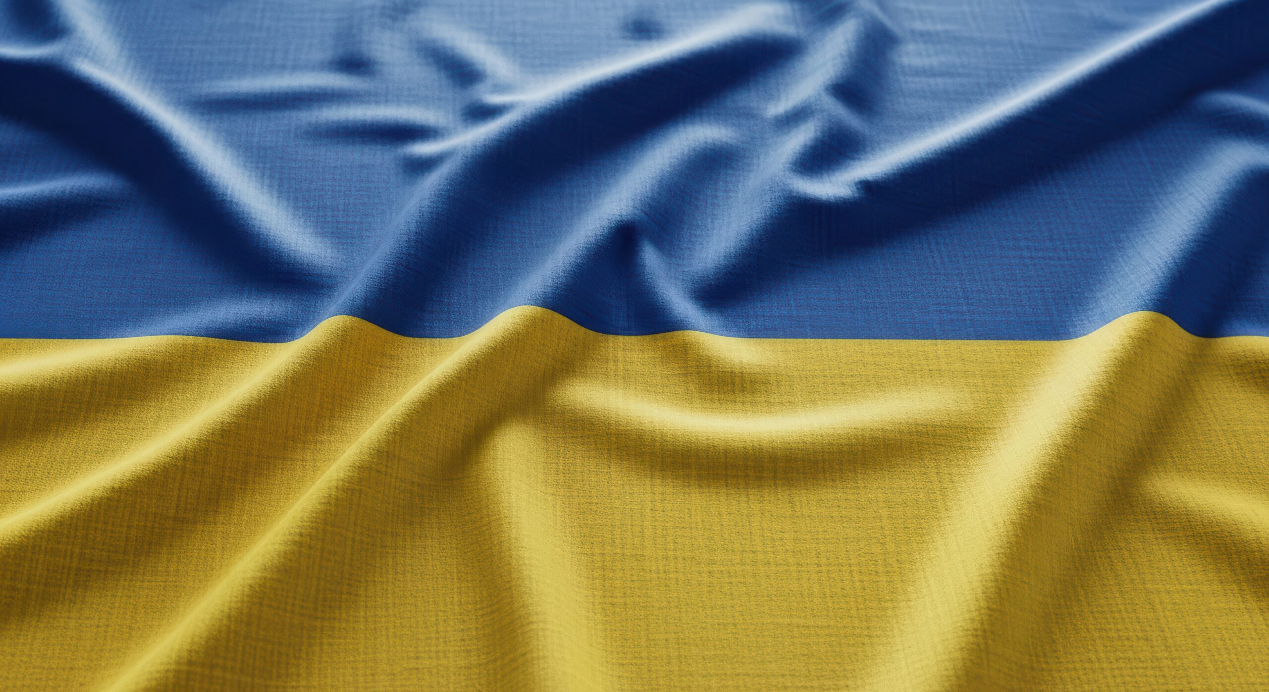 vecteezy wavy ukrainian flag texture close up 74176636 scaled